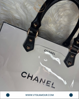 Handmade Plastic-Laminated Paper Tote Bag with Black Handle
 (8 x 10 x 2.75 inches)