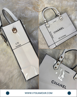 Handmade Plastic-Laminated Paper Tote Bag with White Handle
 (8 x 10 x 2.75 inches)